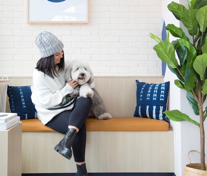 dog and pet parent in Bond Vet Lynnfield clinic lobby